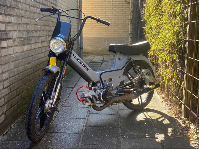 Headlight spoiler round black Puch Maxi / universal product