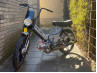 Puch Verlichting Koplampspoiler zwart rond Koplampspoiler rond Puch Maxi / Macho Rider universeel zwart