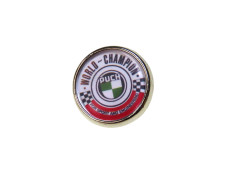 Pin-Button mit Puch World Champion Logo